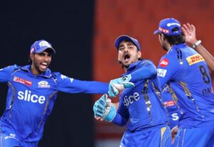 Mumbai Indians Players celebrating while taking wickets 